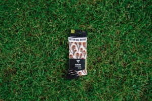 Pack of Outeniqua Bound Ladies Fynbos Socks on the grass
